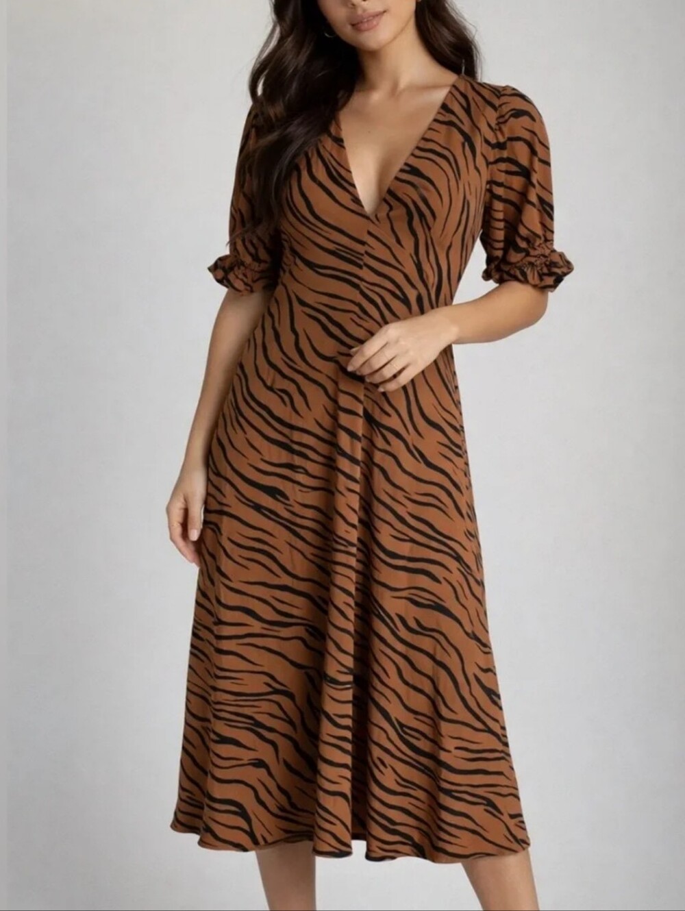 Faithfull the Brand Maggie Midi Dress in Kenya Animal Print.